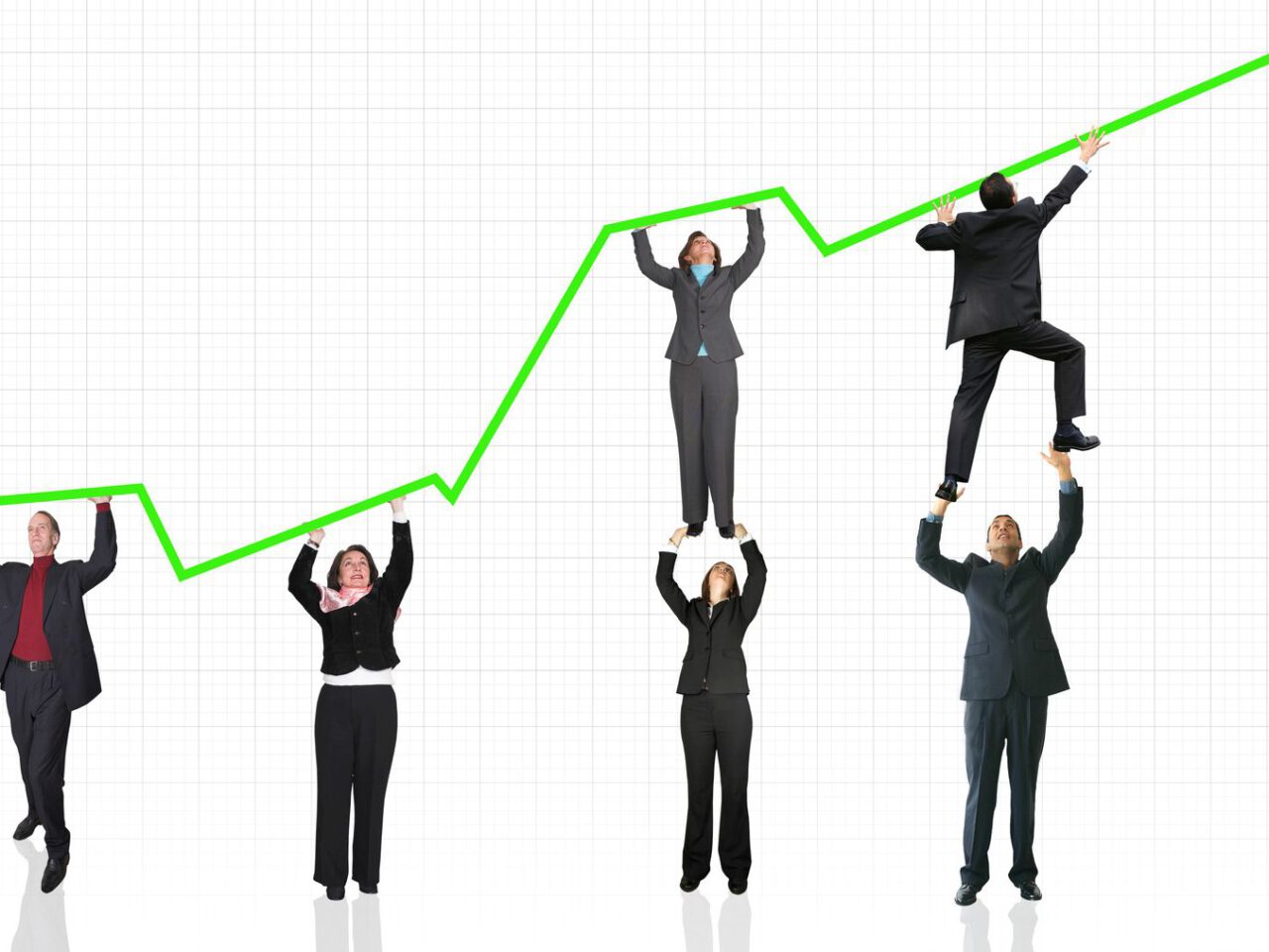 business people pushing a business graph upwards